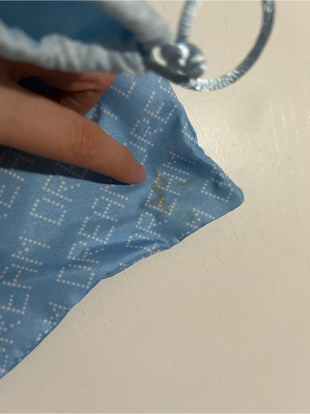 Light Blue Drawstring Pouch with 'DREAM' Pattern
